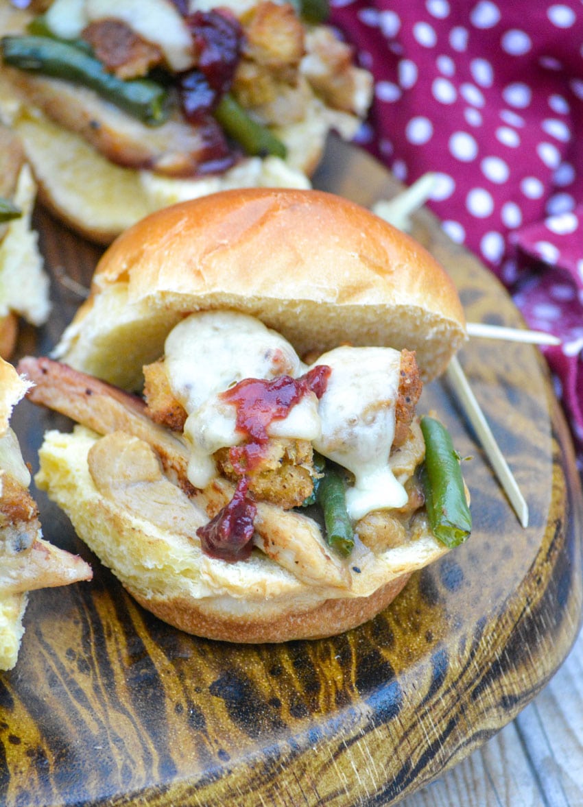 Thanksgiving Leftover Sliders Thanksgiving leftover sliders on a wooden cutting board