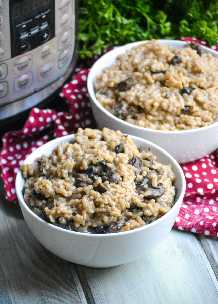 instant pot mushroom riosotto in two white bowls