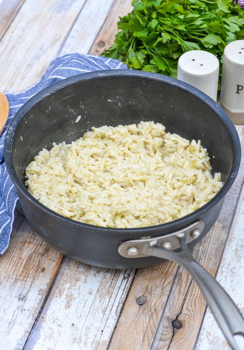 creamy broccoli flavored souper rice in a black pot