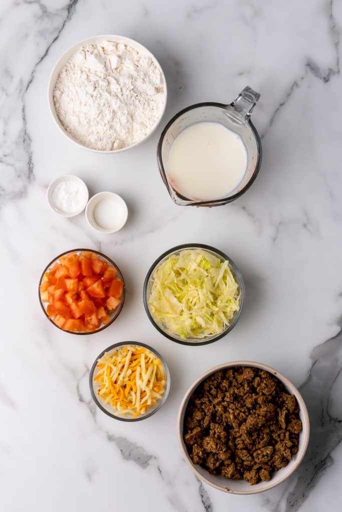 overhead image showing the measured ingredients needed to make a batch of navajo tacos on indian fry bread