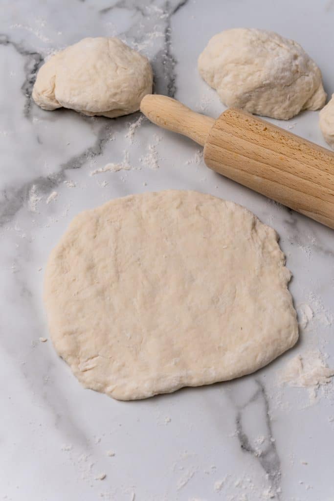 rolled out dough for cherokee fry bread on a floured counter