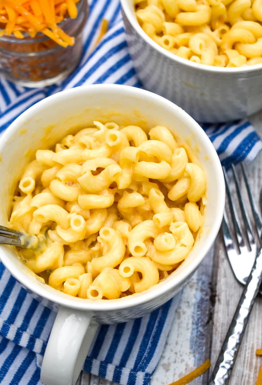 a silver fork stuck in a mug of homemade easy mac