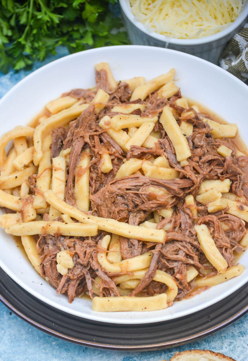 instant pot beef and noodles in a white bowl