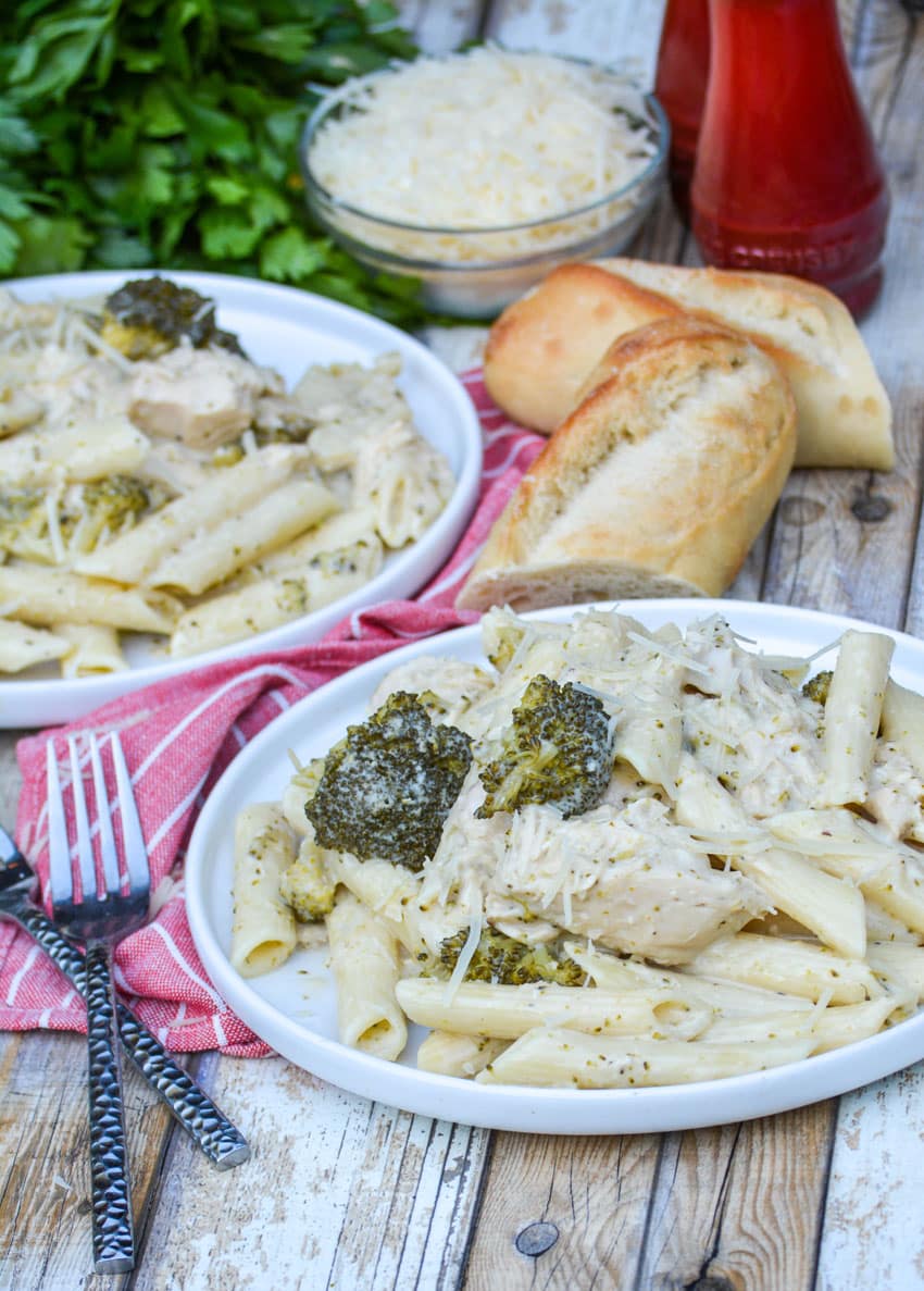 Crock Pot Chicken Alfredo with Broccoli slow cooker chicken alfredo with broccoli served on white plates