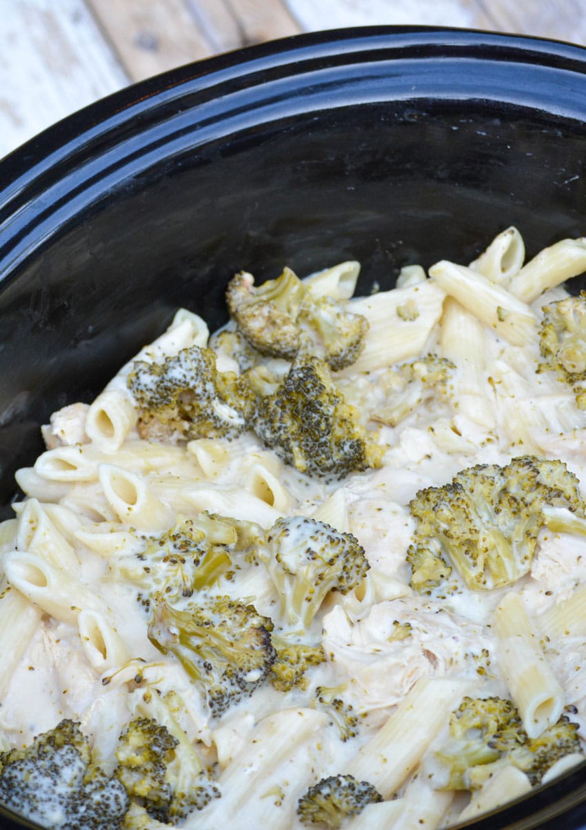 chicken alfredo in a black crockpot