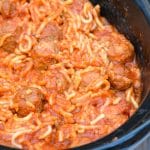 slow cooker spaghetti and meatballs in a black crockpot