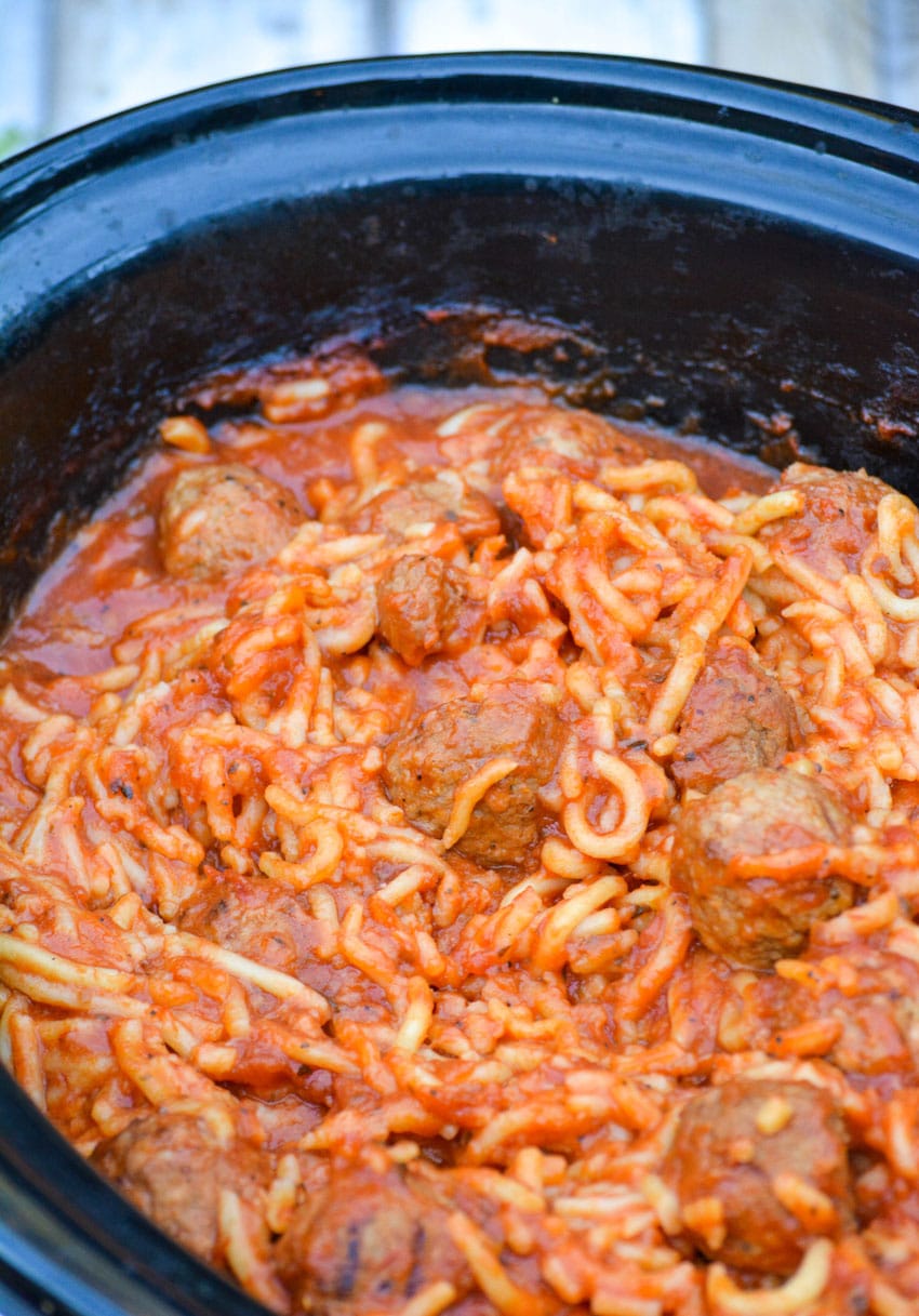 slow cooker spaghetti and meatballs in a black crockpot