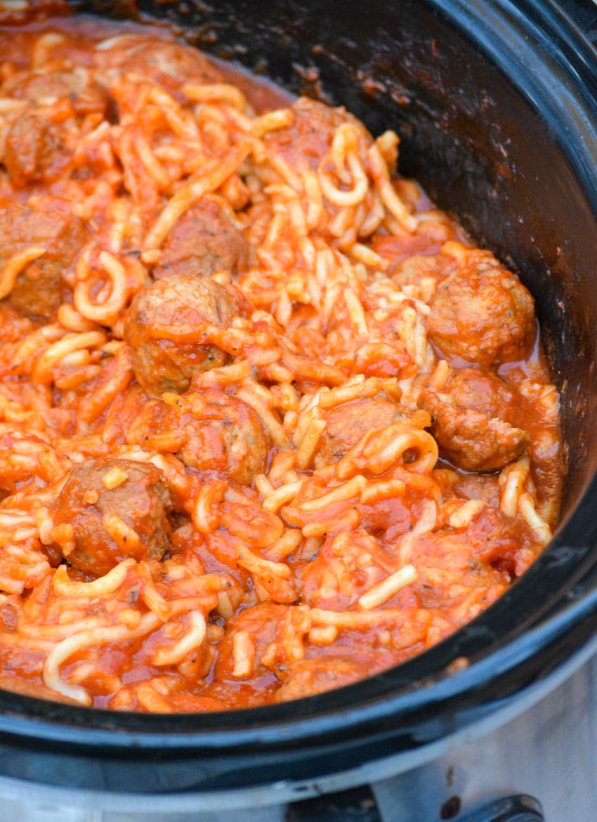 Slow Cooker Spaghetti & Meatballs slow cooker spaghetti and meatballs in a black crockpot