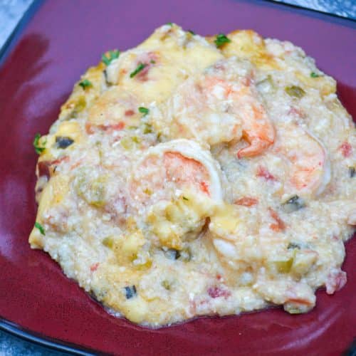 shrimp and grits casserole on a red plate