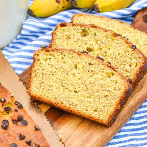slices of three ingredient banana bread on a wooden cutting board