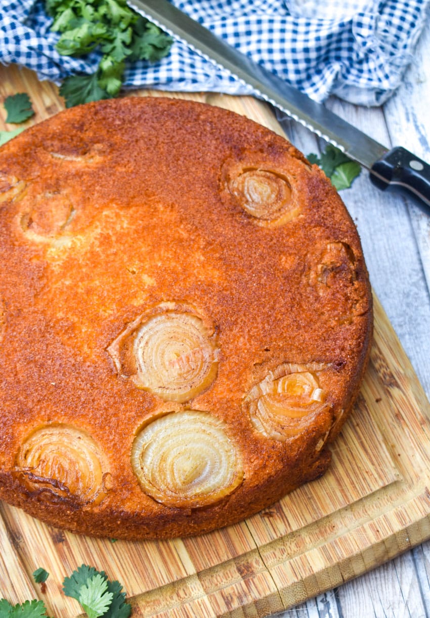 upside down cornbread on a wooden cutting board