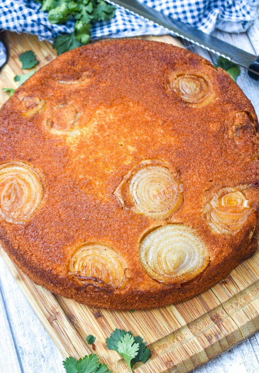 upside down cornbread on a wooden cutting board