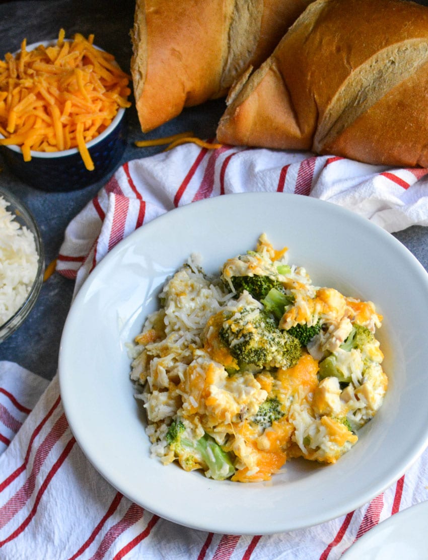 cheesy chicken broccoli and rice casserole in a white bowl