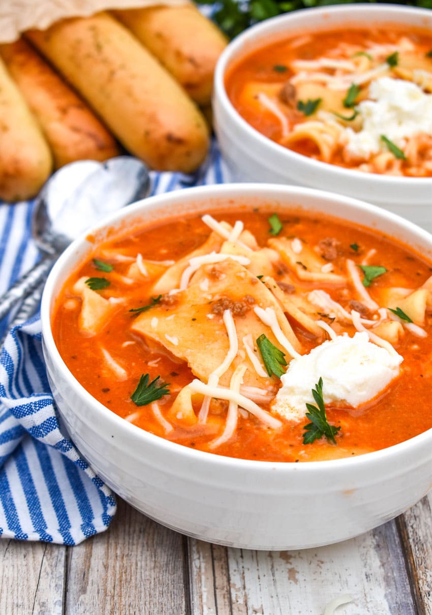 easy slow cooker lasagna soup in white bowls