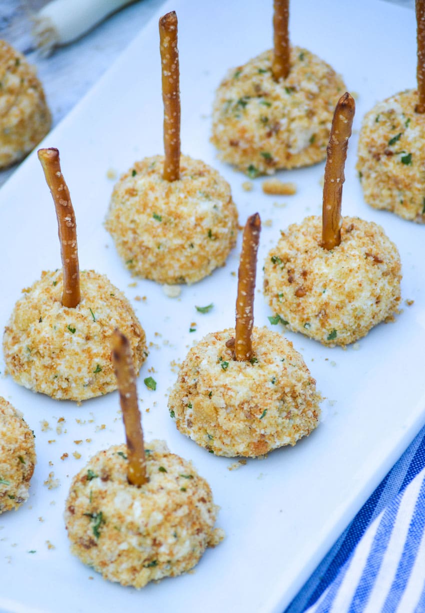 Mini Goat Cheese Balls mini goat cheese balls on a white serving platter