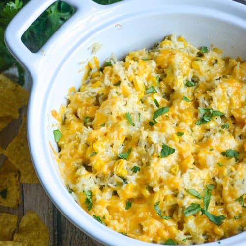 cilantro sour cream rice in a white serving bowl