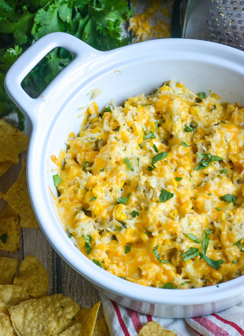 cilantro sour cream rice in a white serving bowl
