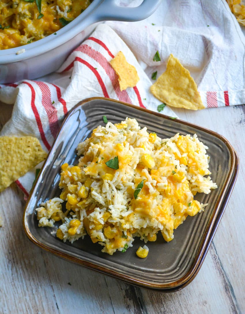cheesy cilantro and sour cream rice on a small brown plate