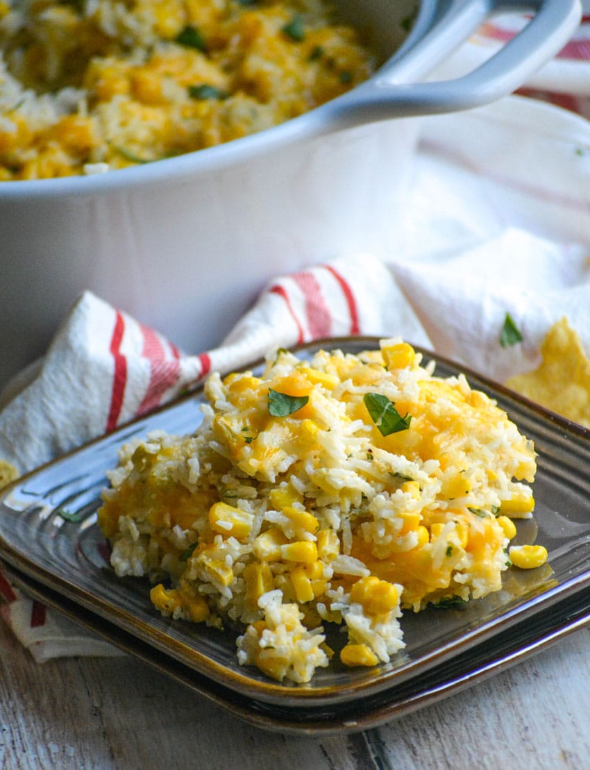 cheesy cilantro and sour cream rice on a small brown plate