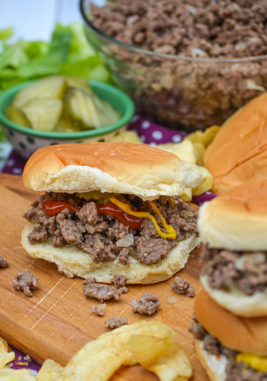 copycat maid rite sandwiches on a wooden cutting board