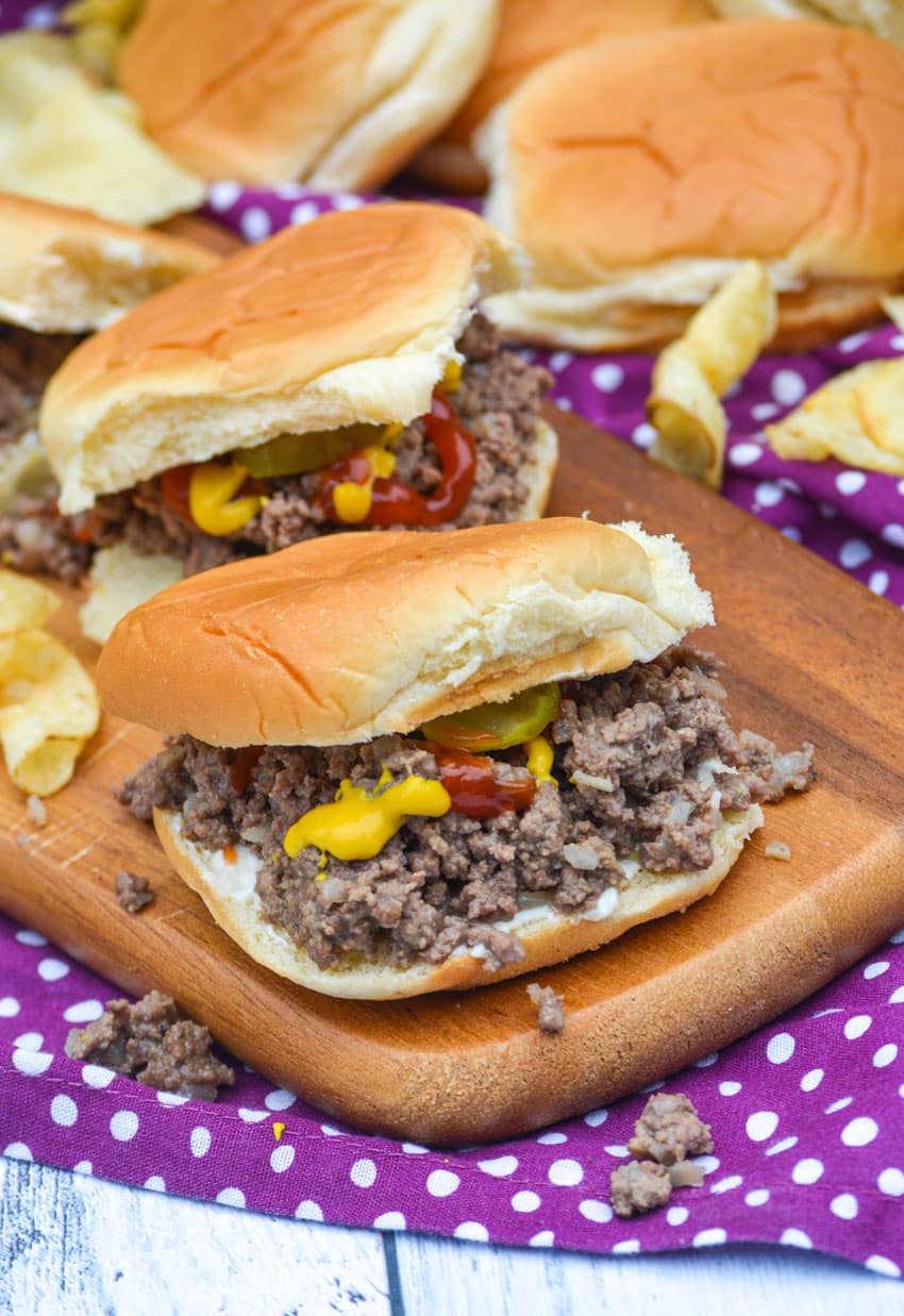 copycat maid rite sandwiches on a wooden cutting board