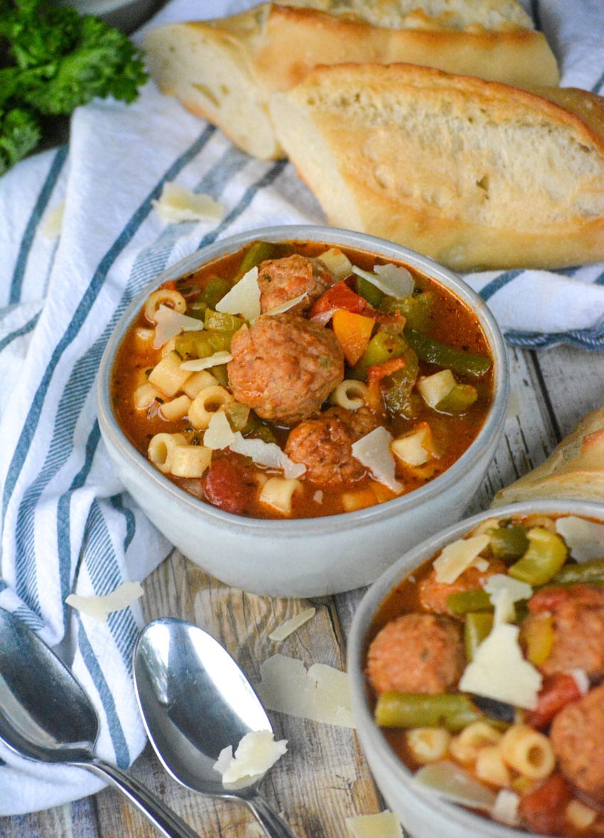 easy vegetable soup with meatballs in a small gray bowl