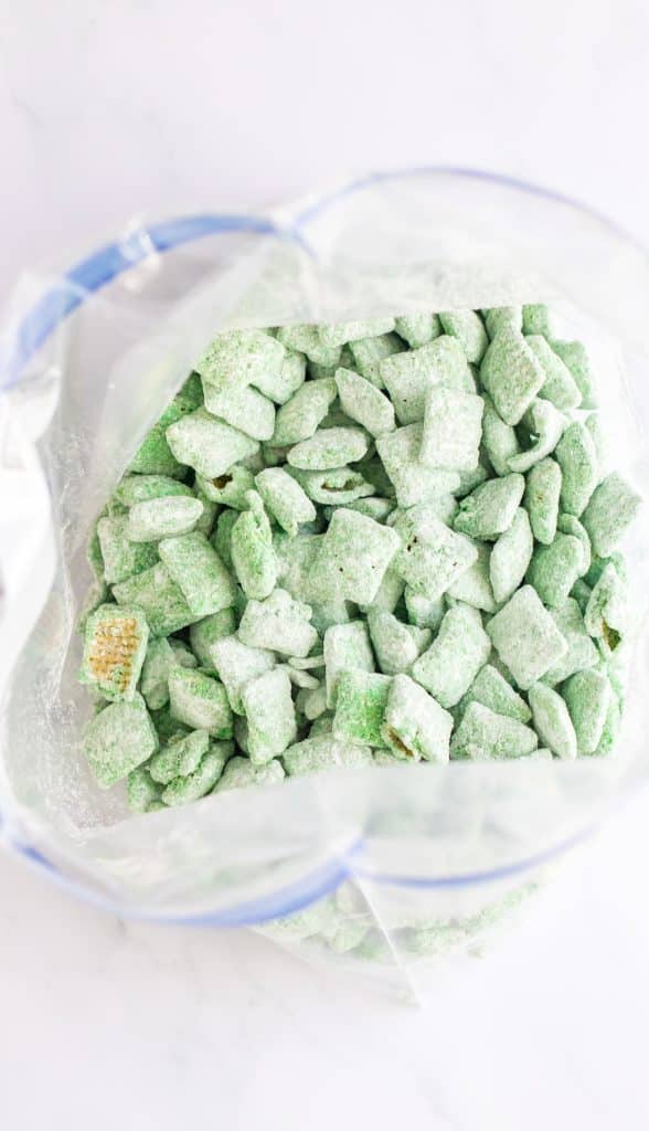 green puppy chow mix in a large plastic ziplocking bag