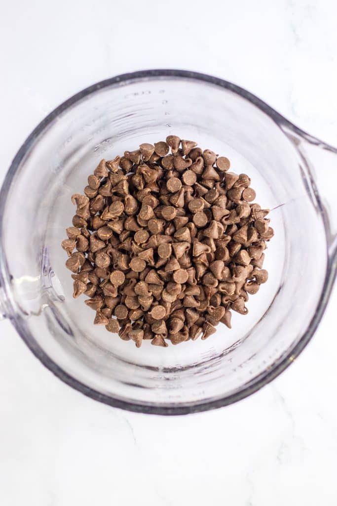 chocolate chips in a glass mixing bowl