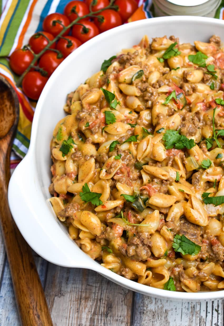 taco mac and cheese in a white serving bowl