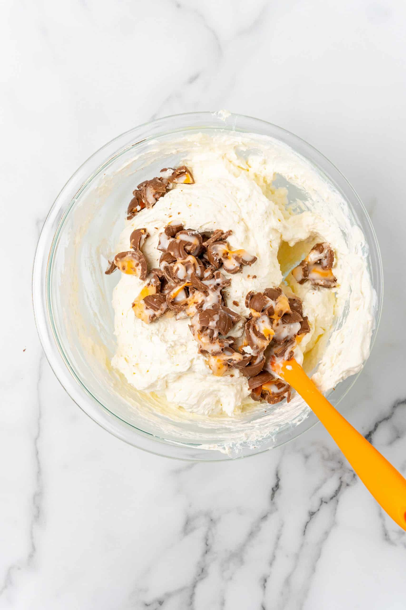 cadbury creme egg dip in a glass mixing bowl