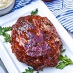 air fryer meatloaf on a small white platter