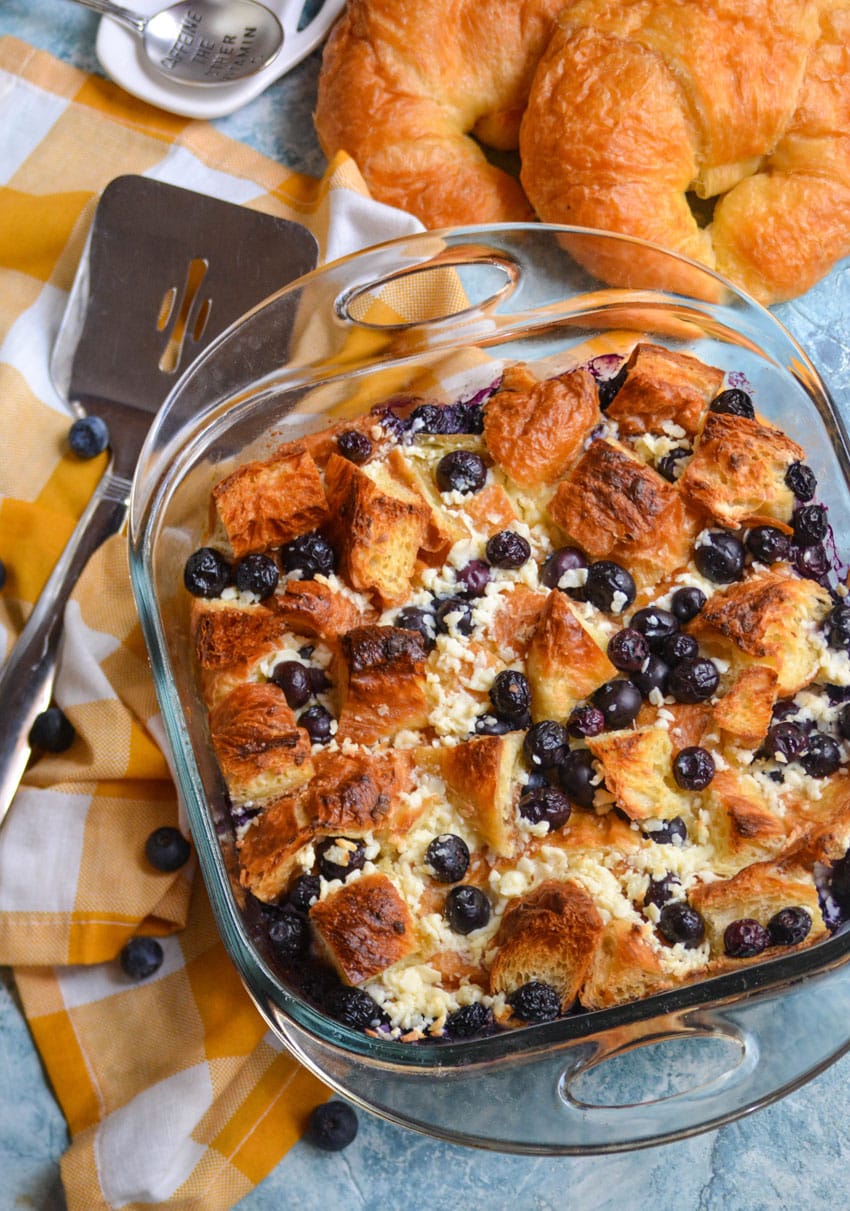 blueberry croissant bake in a glass baking dish