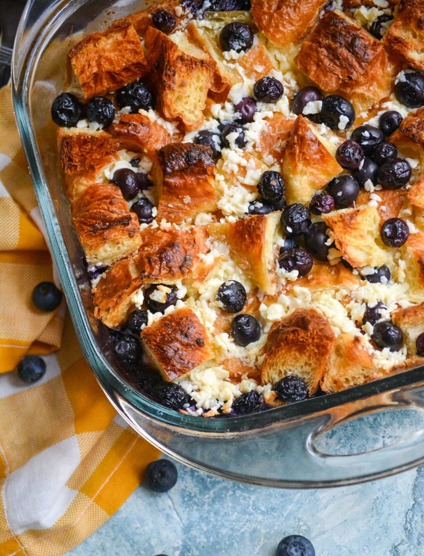 blueberry croissant bake in a glass baking dish