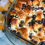 blueberry croissant bake in a glass baking dish