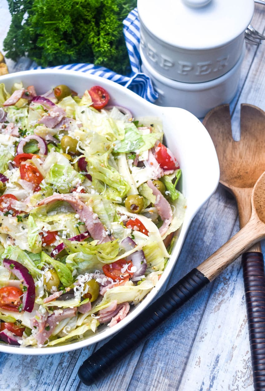 a copycat columbia 1905 salad in a large white serving bowl