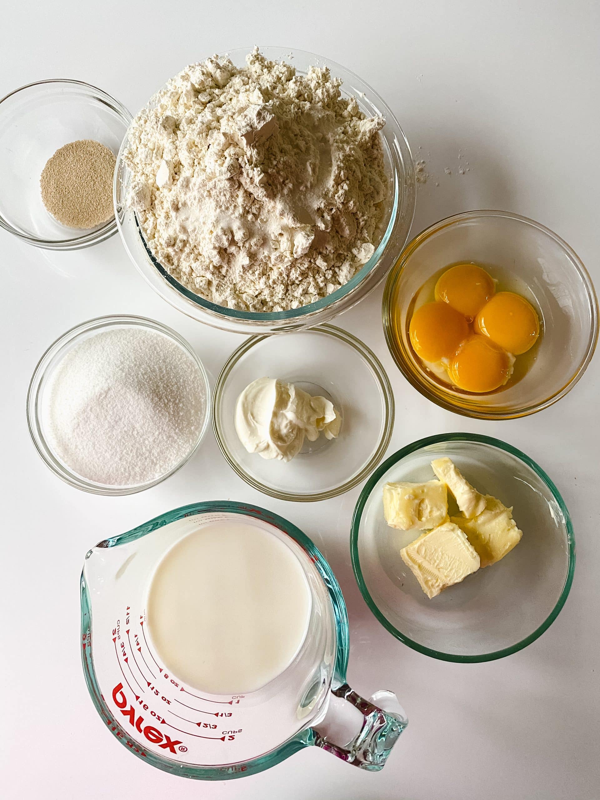 overhead image showing the measured ingredients needed to make a batch of homemade strawberry cream cheese danish