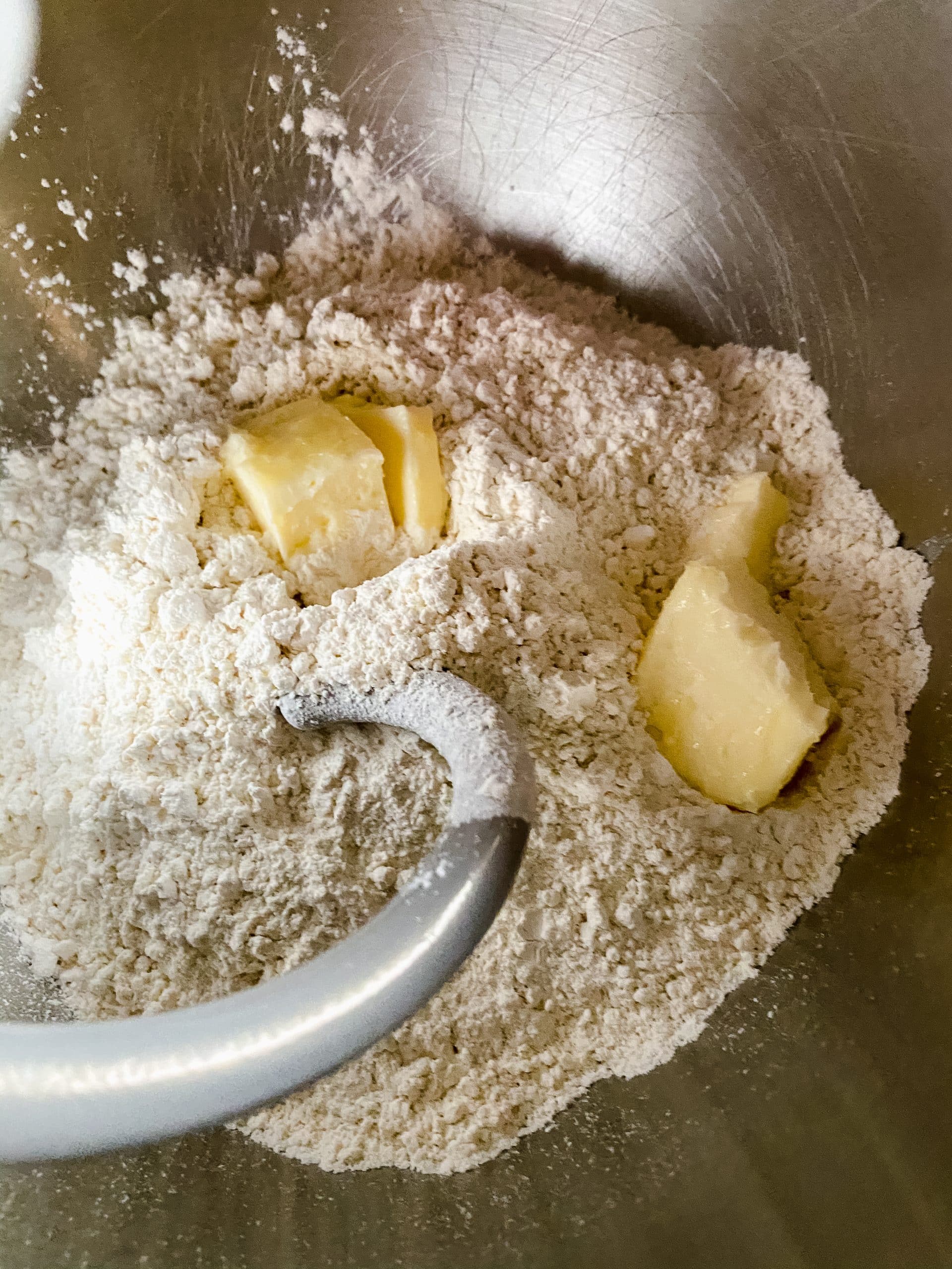 flour and butter in the bowl of a stand mixer