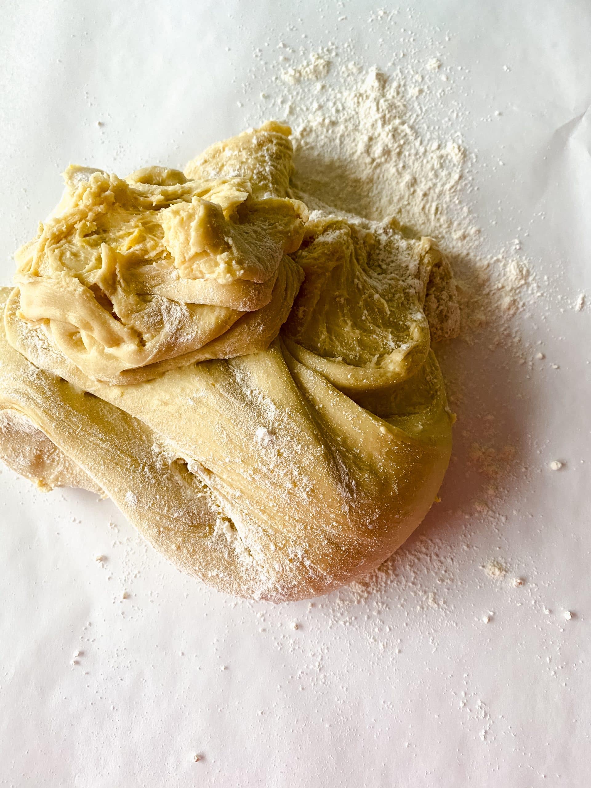homemade danish dough on a floured counter top