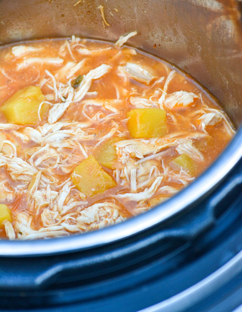sweet pineapple chicken in the bowl of an instant pot