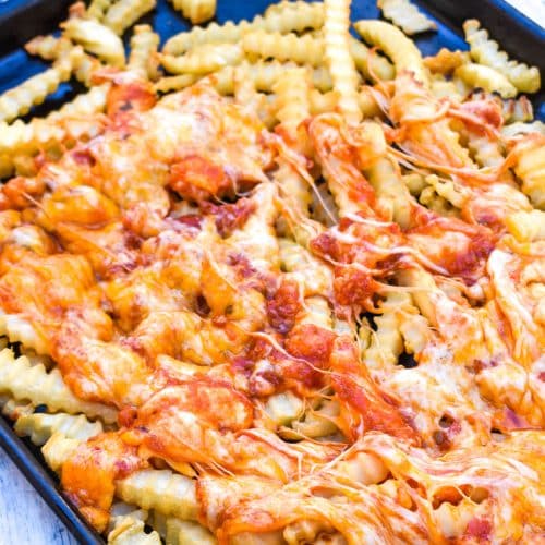 viral tiktok pizza fries on a metal baking sheet