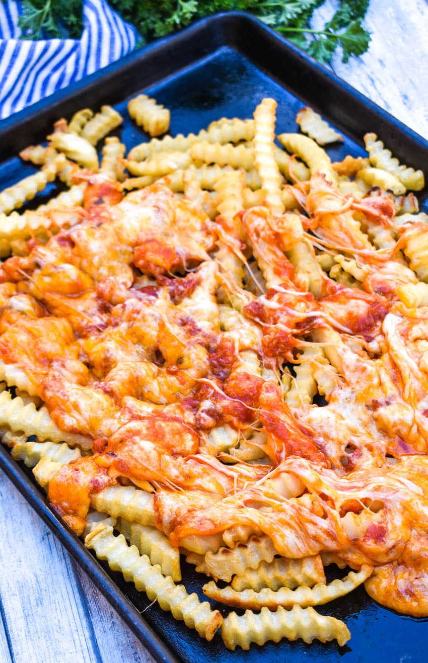 viral tiktok pizza fries on a metal baking sheet