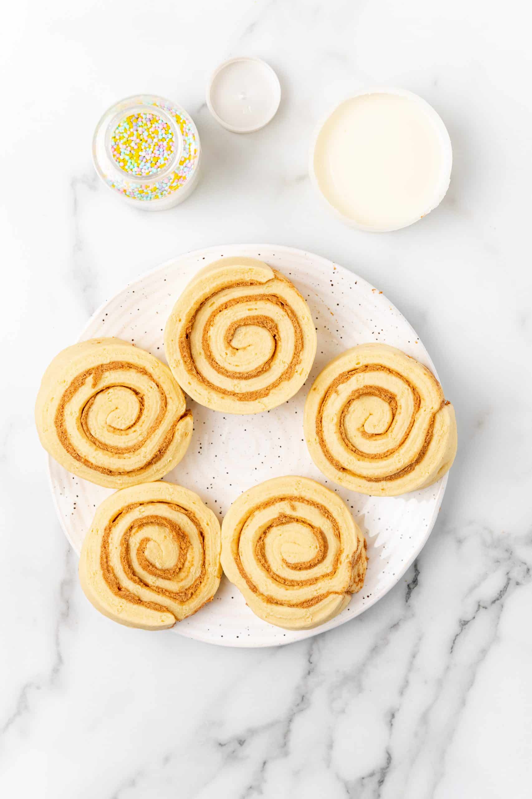 an overhead image showing the measured ingredients needed to make Easter bunny cinnamon buns