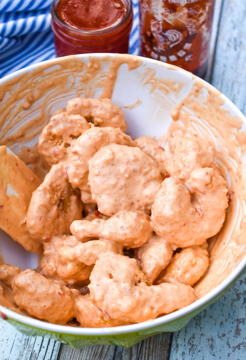 extra large bang bang shrimp in a white mixing bowl