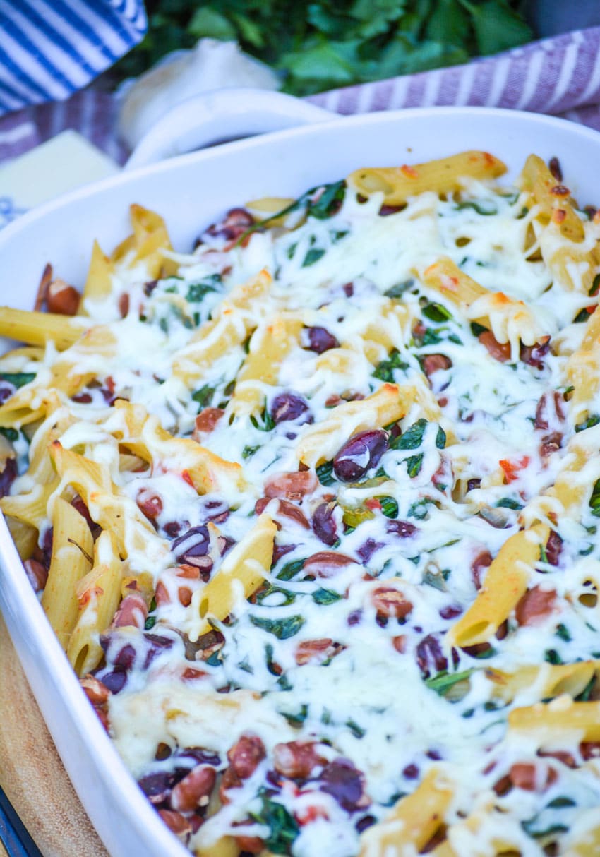 baked pasta e fagioli in a white casserole dish