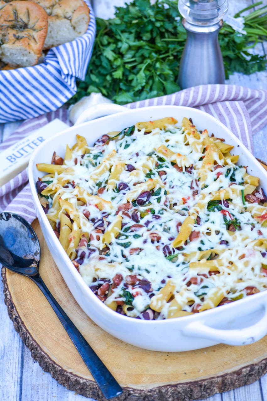 baked pasta e fagioli in a white casserole dish