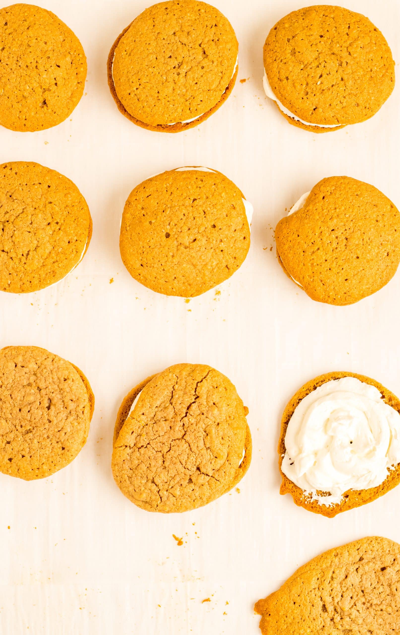 copycat little debbie oatmeal creme pies on a sheet of white parchment paper