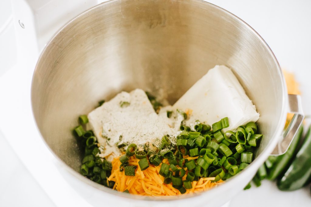 jalapeno popper filling ingredients in a metal mixing bowl