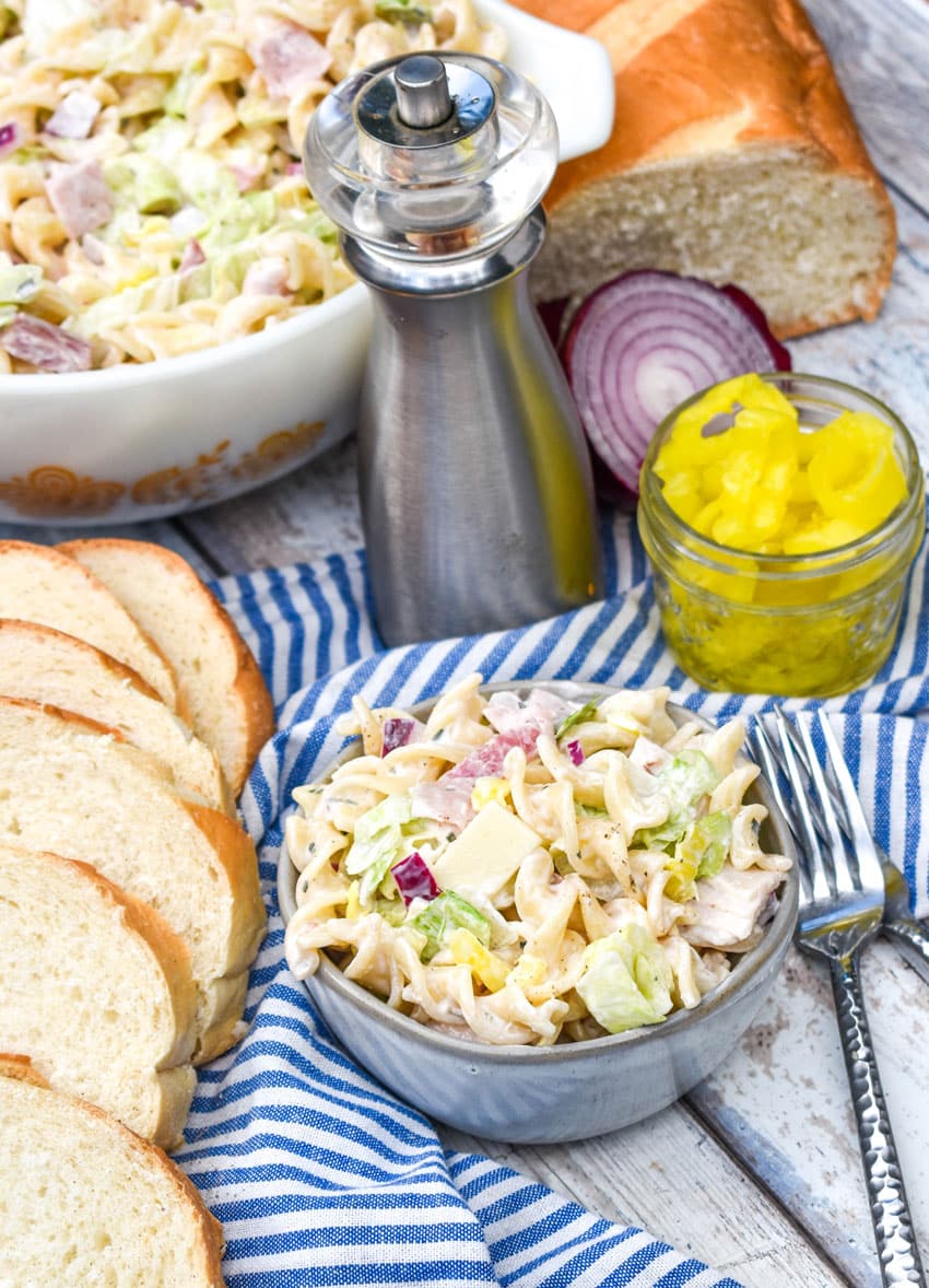Italian grinder pasta salad in a small gray bowl