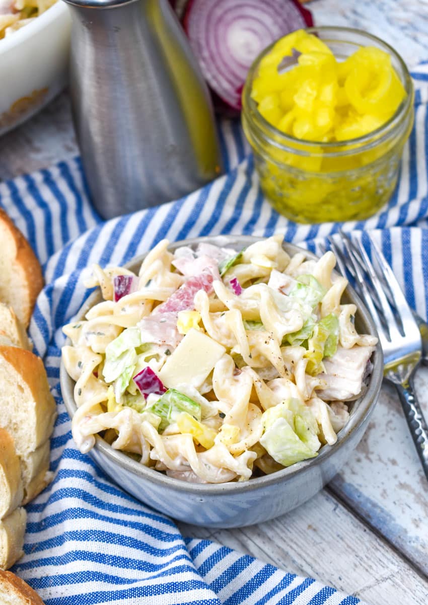 Italian grinder pasta salad in a small gray bowl