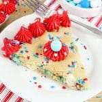 red white and blue cookie cake on a white plate